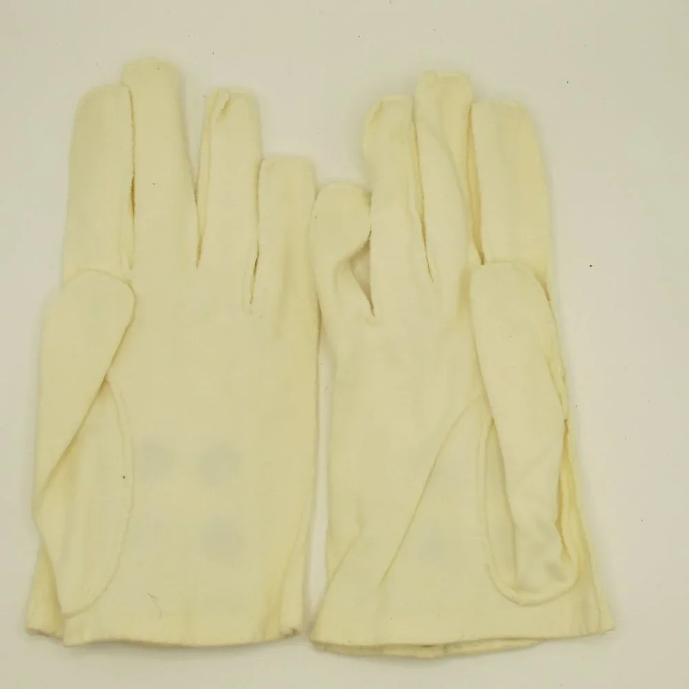 Ladies fashion off-white fabric gloves with red and blue snap closures